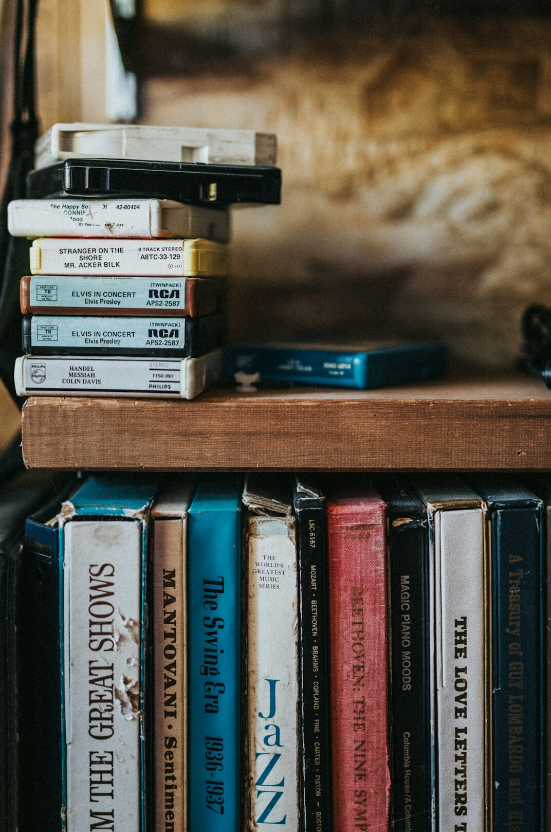 Stack of old film reels and archival television tapes